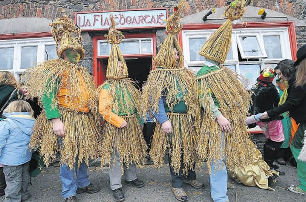 Members of the Green and Gold wren prepare for the Wren day march in Dingle, Co Kerry | Source: Independent.ie