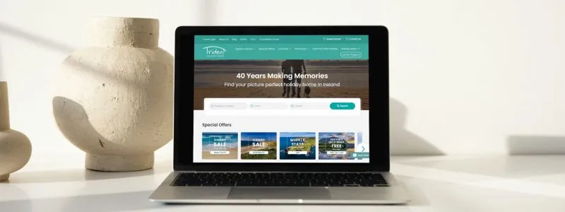Banner for new Trident Holiday Homes website annoucement - laptop view